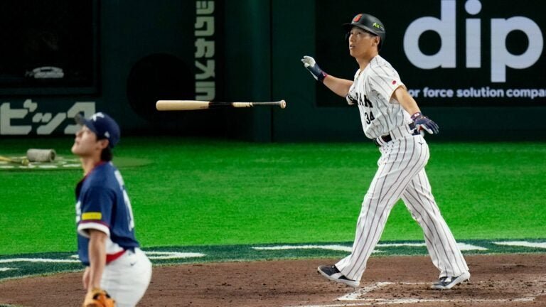 Yoshida hits a home run in Japan’s win, with Maye in attendance