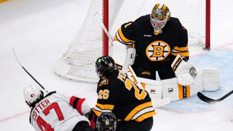 Bruins stop Devils 4-0 to clinch East’s top wild card